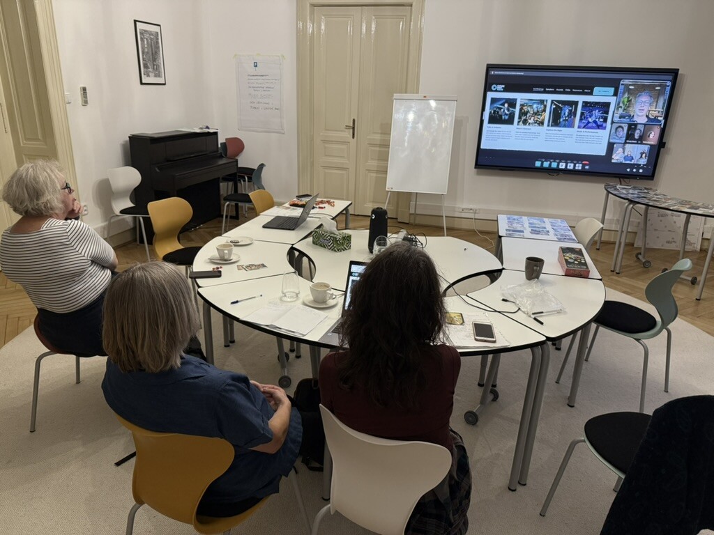 Meetup participants watching an online presentation.